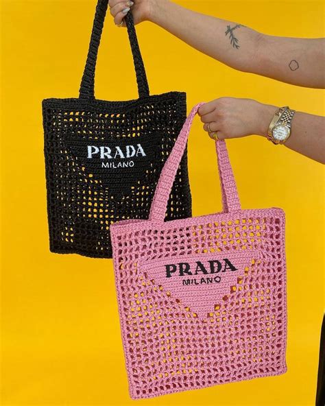 prada raffia tote yellow|Prada beach bag raffia.